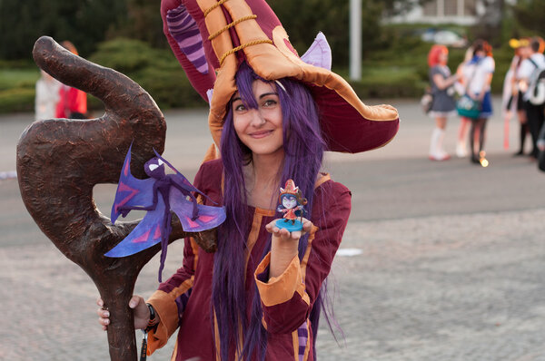 Cosplayer dressed as character Lulu from game League of Legends