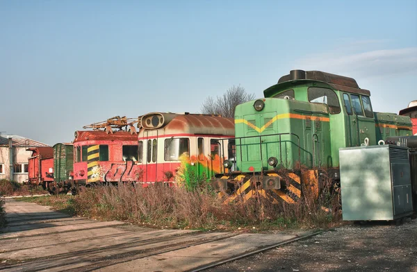 Old abandoned  trains at  depot in sunny day — Stock Photo, Image
