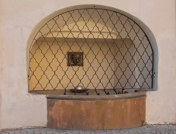 Old jewish fountain with grid — Stock Photo, Image