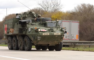 BRNO,CZECH REPUBLIC-MARCH 30,2015: Dragoon Ride -US army convoy drives on March 30,2015  through Brno , returns from the Baltic countries to a German base, enters the territory of the Czech Republic. clipart