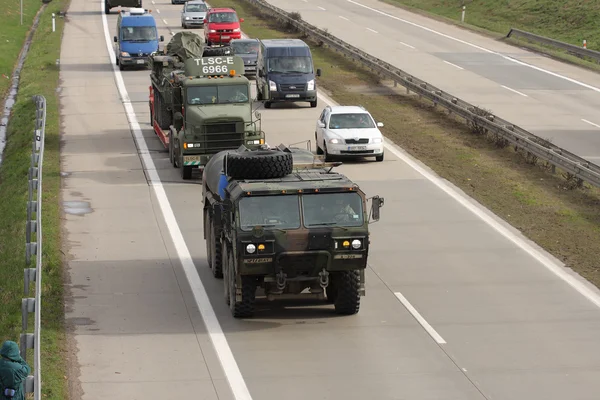 BRNO, CZECH REPUBLIC-MARCH 30,2015: Dragoon Ride-US army convoy drives on March 30,2015 through Brno, returns from the Baltic countries to a German base, enters the territory of the Czech Republic . — стоковое фото