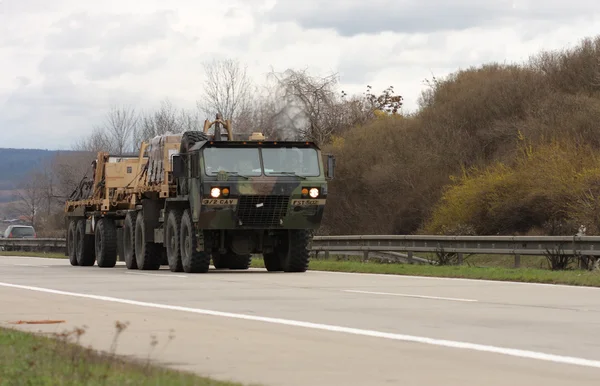 BRNO, CZECH REPUBLIC-MARCH 30,2015: Dragoon Ride-US army convoy drives on March 30,2015 through Brno, returns from the Baltic countries to a German base, enters the territory of the Czech Republic . — стоковое фото