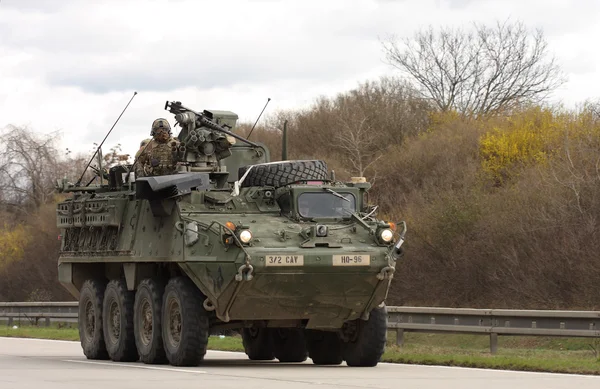 BRNO, CZECH REPUBLIC-MARCH 30,2015: Dragoon Ride-US army convoy drives on March 30,2015 through Brno, returns from the Baltic countries to a German base, enters the territory of the Czech Republic . — стоковое фото