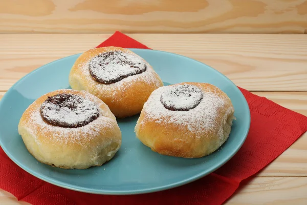 Cottage cheese cakes  with jam on blue plate — Stock Photo, Image