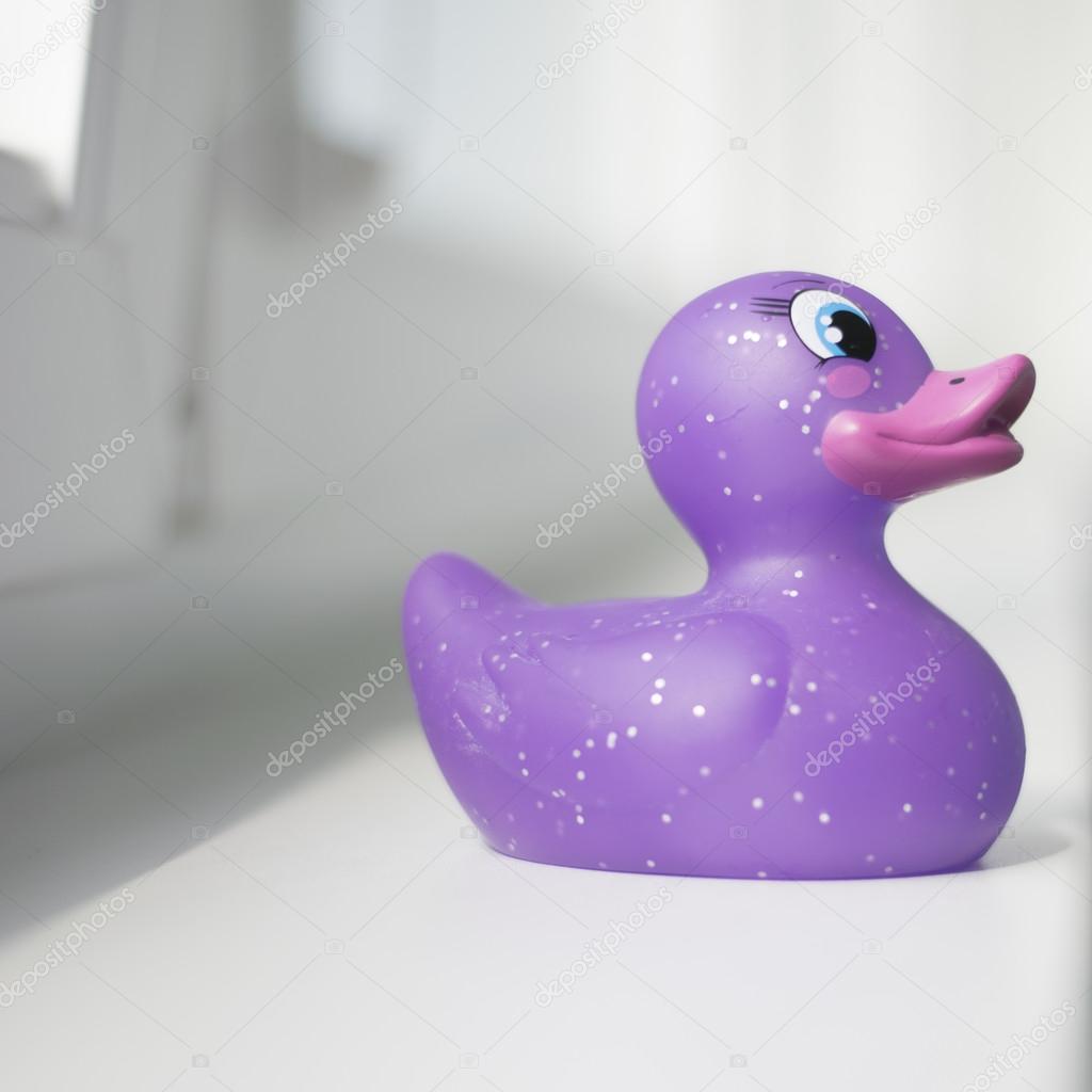 Image of a cute rubber purple duckling 