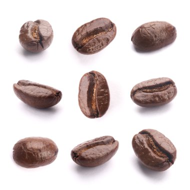 beyaz üzerine kahve çekirdekleri