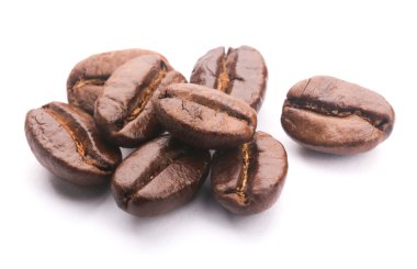 beyaz üzerine kahve çekirdekleri