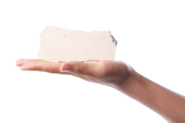 Bloque de piedra en blanco en la mano — Foto de Stock