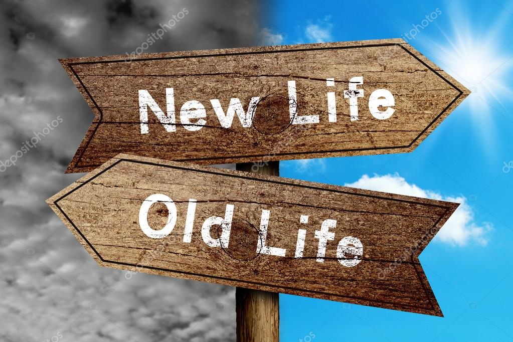 New Life Or Old Life concept road sign with cloudy and sunny sky background.