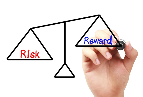 Баланс риска и вознаграждения — стоковое фото
