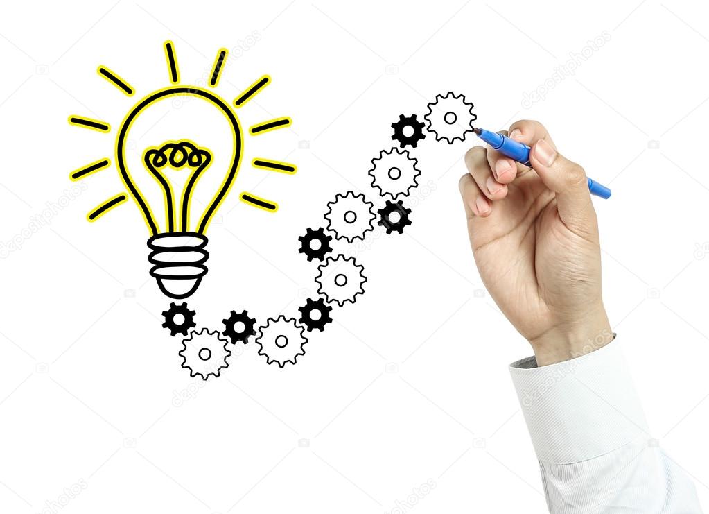 Businessman drawing light bulb and gears