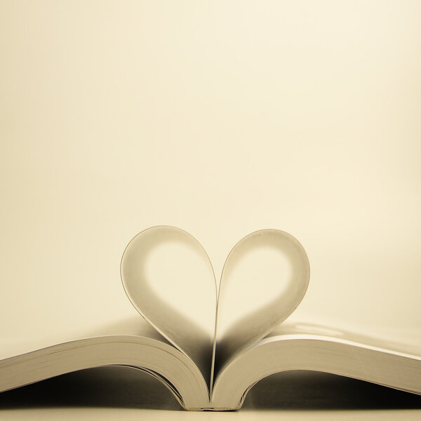 Opened book with heart page