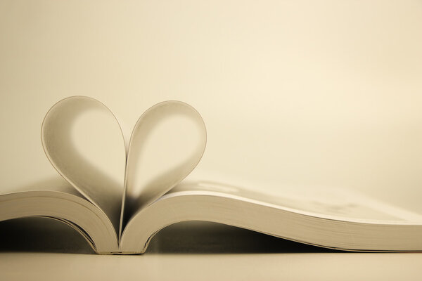 Opened book with heart page