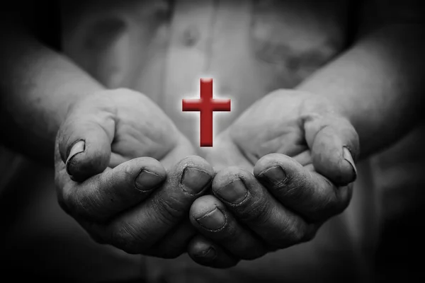 Cross in hand — Stock Photo, Image