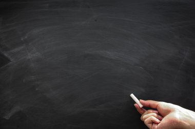 Blackboard with hand