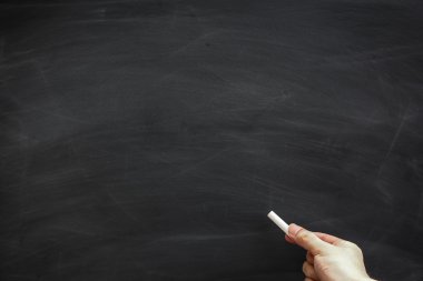 Blackboard with hand