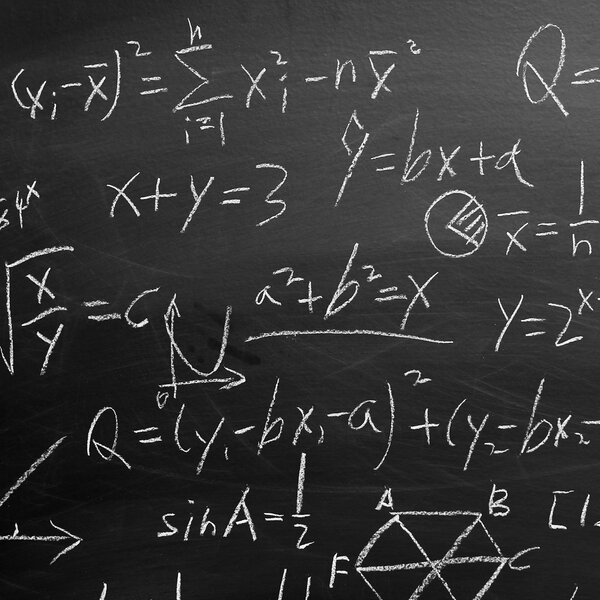 Maths formulas on chalkboard background