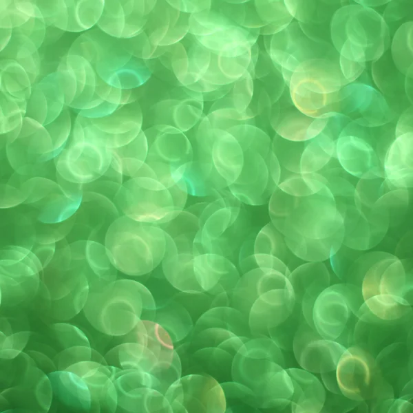緑のキラキラの背景 — ストック写真