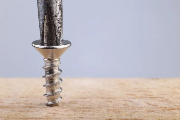 Screw Screwed into Wooden Plank — Stock Photo, Image