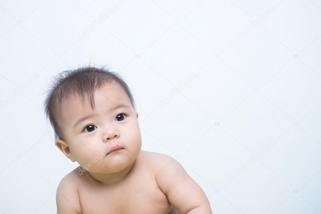 baby girl posed on background
