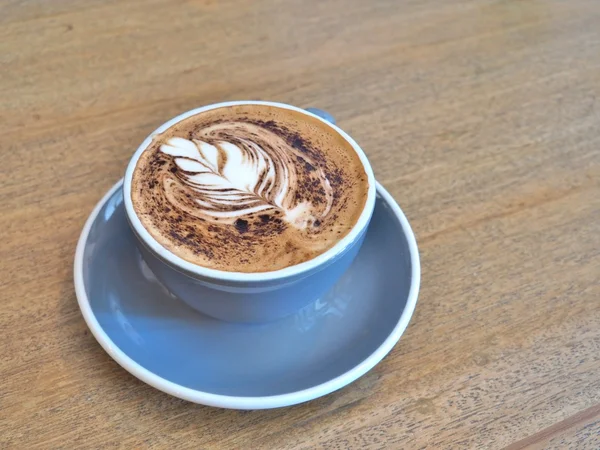 A cup of coffee with Rosetta pattern — Stock Photo, Image