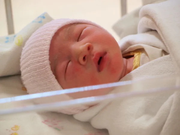 Newborn baby on the bed — Stock Photo, Image