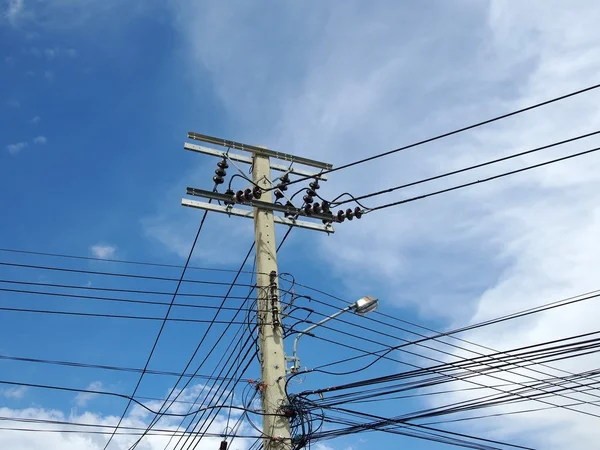 Electrical pole with power line cables — Stock Photo, Image