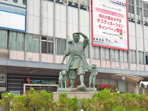 Momotaro and his friends - monkey, dog and pheasant in front of Okayama railway station. — Stock Photo, Image