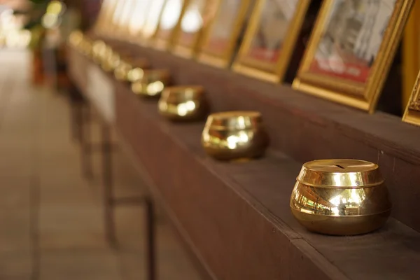 Golden monk's food bowl — Stock Photo, Image