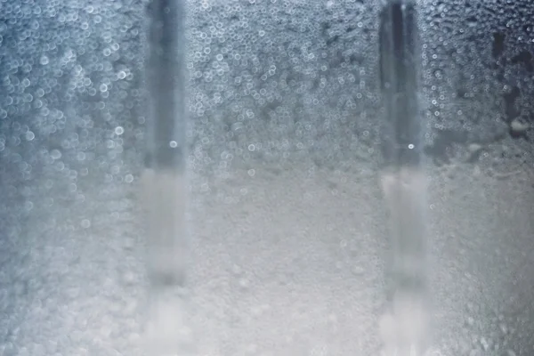 Abstract water binnen de plastic fles vervagen — Stockfoto