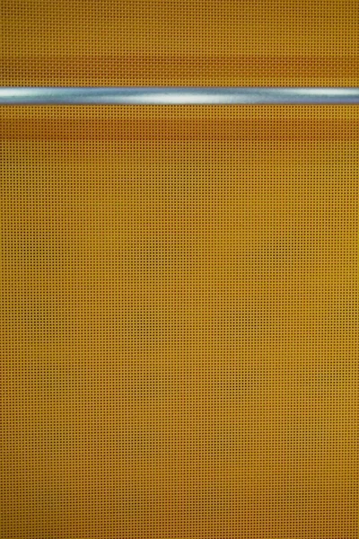 Textura de tela naranja con tubo inoxidable — Foto de Stock