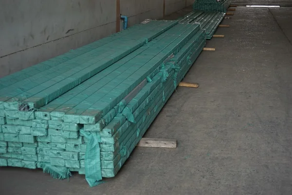 Stack of metal tube in warehouse — Stock Photo, Image