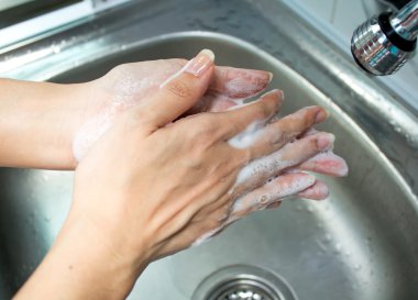 Washing of female hands  clipart