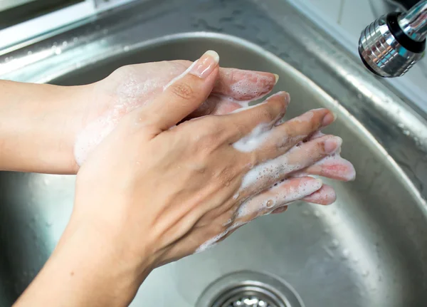 Washing of female hands Royalty Free Stock Images