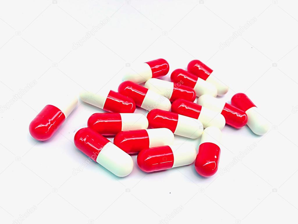 Medical capsules on white background. — Stock Photo © kamontad999 64040429