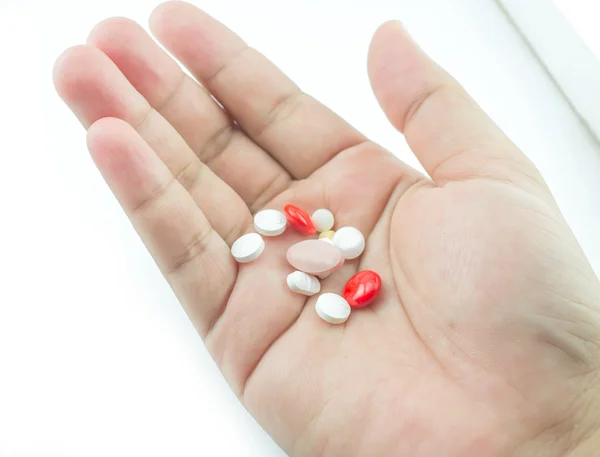 Pills in hand — Stock Photo, Image