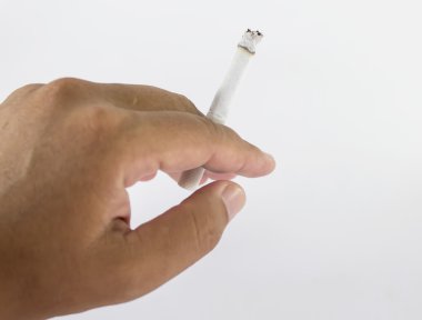 beyaz kağıt üzerinde elinde Sigara