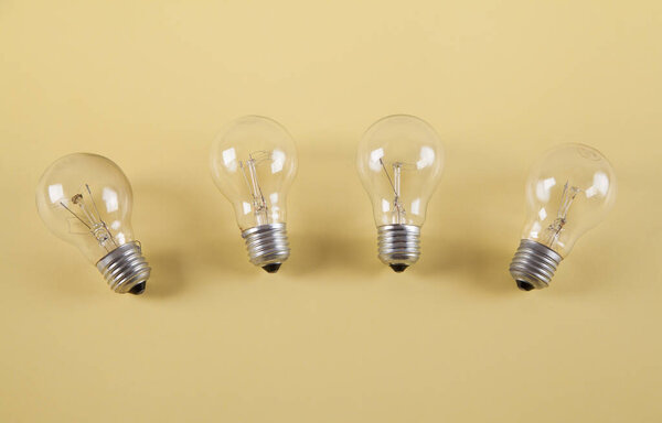 Light bulbs isolated on a yellow background.