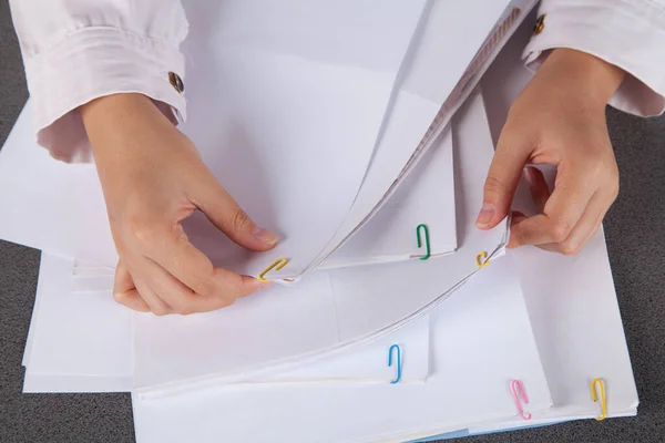 Businesswoman checking document. Business papers for annual report files. Business offices concept.