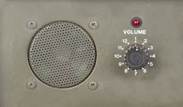 Old dial volume switch with speaker and red light indicator — Stock Photo, Image