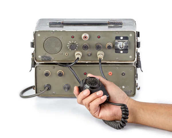 Tmavě zelená amatérský radioamatéry drží v ruce na bílém pozadí — Stock fotografie