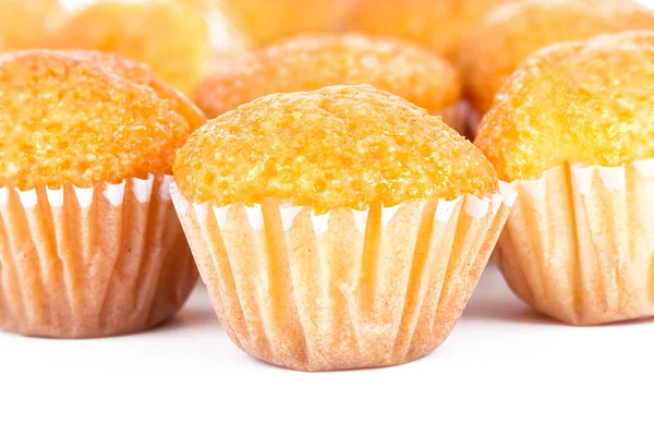 Delicious mini muffins on a white background Stock Image