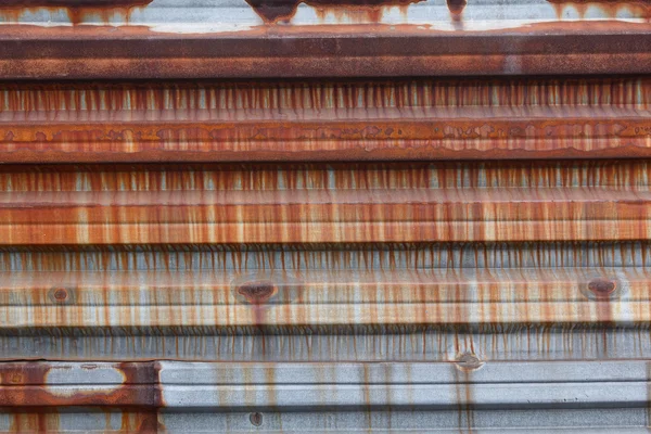 Rusty corrugated metal sheet. Backgrounds and textures — Stock Photo, Image