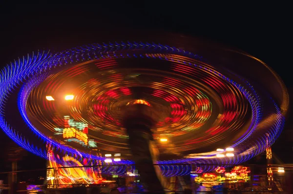 Evening lights rotating swing. Abstract — Stock Photo, Image