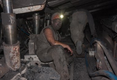 Donetsk, Ukrayna - Ağustos 16, 2013: madenciler, iş sıkışık c
