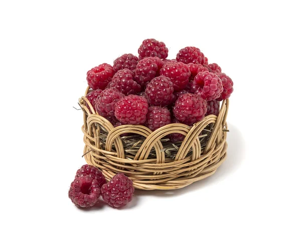 Raspberry in a wicker basket. Isolated on white background — Stock Photo, Image