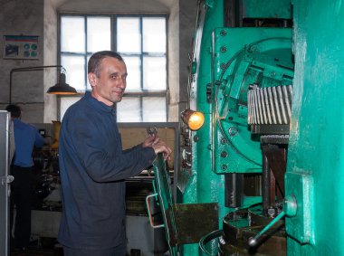 Ukraine, Anthracite - May 15, 2013: Repairer in the workplace. A