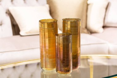 Modern vases on the table in an elegant interior close-up