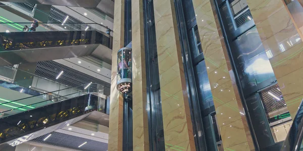 Escalators and elevators at the mall. Panoramic view