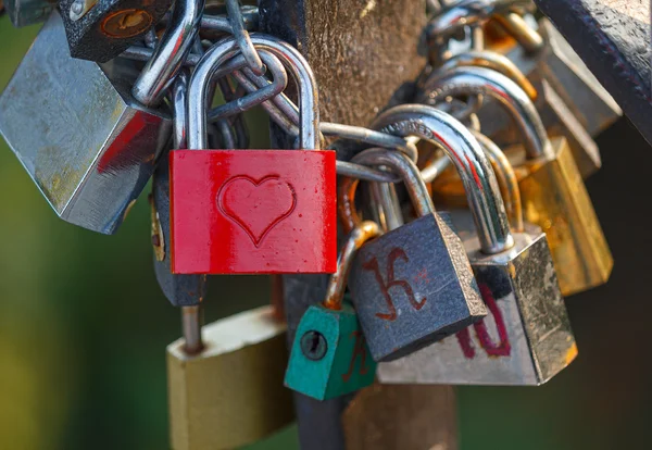 Group of padlocks on the bridge of lovers — Stock Photo, Image